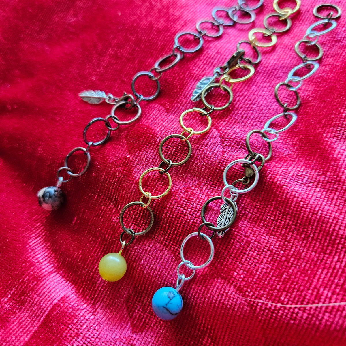 Knitted fish with 10 rings and semi-precious stones