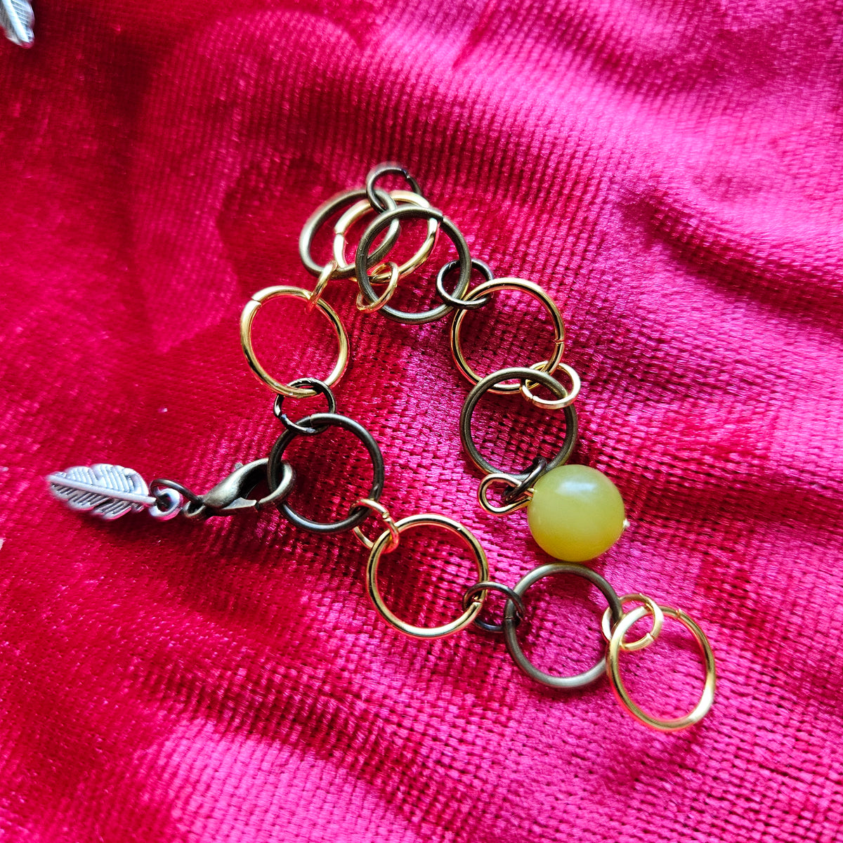 Knitted fish with 10 rings and semi-precious stones
