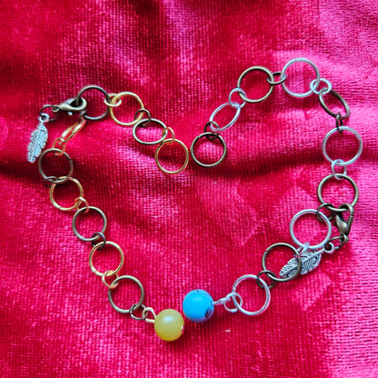 Knitted fish with 10 rings and semi-precious stones