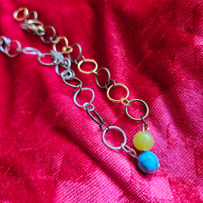 Knitted fish with 10 rings and semi-precious stones