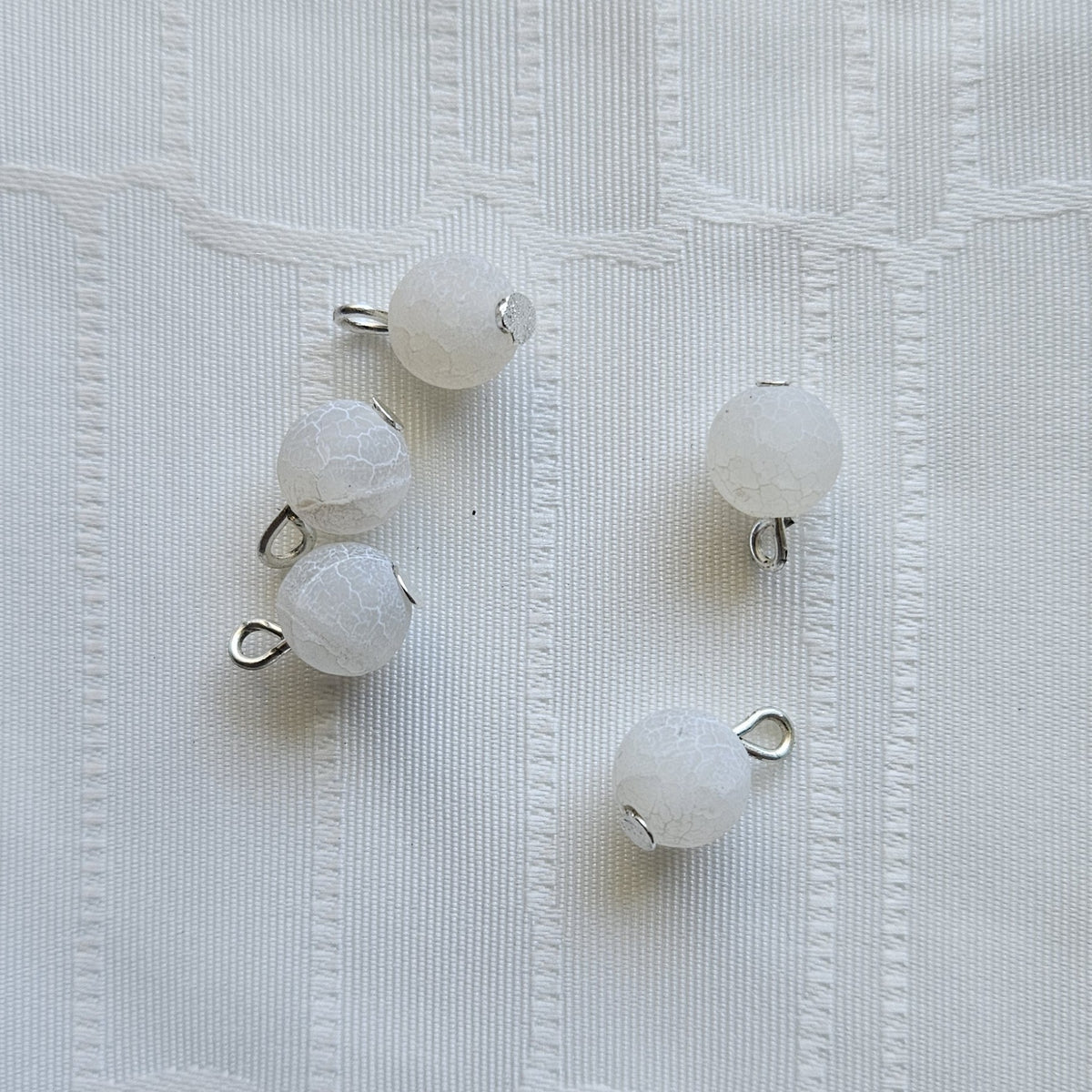 Knitted fish with 10 rings and semi-precious stones